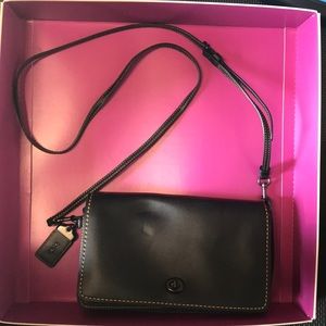 Coach handbag with additional chain strap.